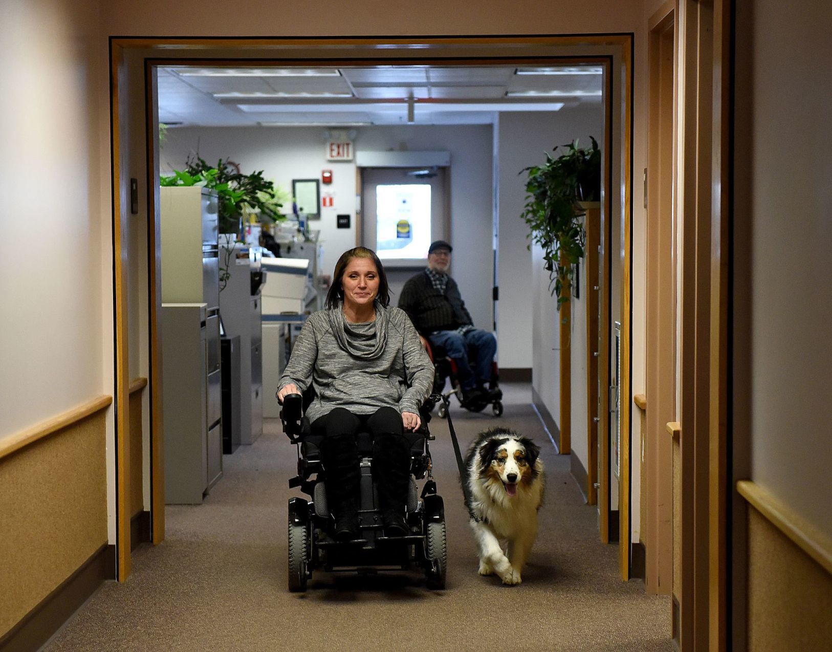 Jennifer Crowell and Journey in hallway